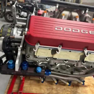 Aluminum 440CI R5 P7, Buy Aluminum 440CI R5 P7, Ernie Elliott aluminum motor, Elliott street performance engine, Elliott Mopar street motor, custom R5 street conversion, aluminum Dodge racing block, aluminum Mopar powerplant, big inch R5 motor, 440 cubic inch Dodge race motor, large displacement Mopar V8, stroked R5 racing motor, long stroke Dodge race engine, streetable NASCAR motor, road legal race derived engine, race technology street motor, exotic Mopar street engine, custom Dodge restomod motor, pro touring Mopar powerplant, premium Mopar restomod engine, custom classic Dodge motor, high end Mopar build, EFI converted NASCAR engine, fuel injected R5 motor, R5 electronic injection, custom EFI Dodge race motor, R5 injector rails, race engine EFI conversion, standalone ECU R5, programmable Dodge racing ECU, sequential injection race motor, modernized Mopar V8, crank trigger Dodge engine, crank triggered Mopar motor, electronic ignition R5, race engine crank sensor, standalone ignition Dodge, custom ignition trigger wheel, EFI ignition synchronization, modern race engine electronics, street race ECU conversion, custom engine management Mopar, air conditioned race engine, R5 air conditioning bracket, custom AC compressor mount, Mopar performance AC setup, street engine accessory drive, custom racing accessory bracket, serpentine conversion R5, race motor street accessories, custom alternator bracket Mopar, street conversion accessory system, dyno time only motor, low runtime Dodge engine, dyno tested Mopar motor, dyno run performance engine, engine dyno documentation, dyno sheet Dodge motor, low hour race derived engine, unused street project motor, specialist used Dodge engine, documented performance powerplant, all alloy Mopar engine, lightweight Dodge V8, aluminum block street motor, aluminum head Dodge engine, lightweight restomod engine, performance aluminum V8, premium alloy powerplant, custom aluminum engine, specialist alloy race motor, competition derived aluminum V8, R5 block street build, P7 cylinder head street engine, Dodge race architecture, Mopar motorsport technology, stock car derived V8, NASCAR technology restomod, racing cylinder head Mopar, high flow P7 heads, Dodge competition head engine, professional race architecture, big cube Mopar street build, 440 inch custom motor, 440 cube aluminum V8, large displacement Dodge project, stroker Mopar street engine, high torque R5 motor, custom big inch race engine, long stroke R5 conversion, large cube competition V8, custom displacement Mopar engine, classic Dodge engine swap, Plymouth restomod powerplant, Challenger custom race engine, Charger restomod motor, Dart custom powerplant, Barracuda performance engine, Duster race derived motor, Mopar muscle car engine swap, classic Chrysler performance motor, custom Dodge engine swap, pro touring Dodge engine, high end muscle car powerplant, street performance Mopar build, custom fabrication Dodge engine, R5 engine mounting solution, R5 transmission conversion, custom bellhousing R5, racing engine adapter plate, Mopar drivetrain conversion, custom motor plate Dodge, race engine street installation, specialist R5 fabrication, custom exhaust R5 motor, performance cooling system Dodge, street dry sump conversion, race lubrication street car, custom oil tank Mopar, R5 cooling system, street race radiator setup, high performance fuel system, EFI fuel pressure system, return style race fuel system, custom fuel pump Dodge, performance injector sizing, EFI throttle body Mopar, standalone ECU tuning, street dyno calibration, drivability tuning race engine, cold start EFI tuning, part throttle race motor tuning, custom engine calibration, professional Mopar tuning, R5 maintenance guide, P7 engine service information, race derived engine inspection, aluminum block engine care, high performance V8 maintenance, used performance engine inspection, dyno motor buying guide, restomod engine buying guide, custom race engine checklist, specialist engine evaluation, rare Mopar engine supplier, custom Dodge engine dealer, exotic performance motor sales, used aluminum V8 dealer, specialist restomod engine shop, Mopar racing parts retailer, competition engine marketplace, premium powertrain supplier, custom engine sales online, performance V8 catalogue, engine pallet freight, aluminum engine transportation, race motor shipping service, custom powerplant logistics, nationwide engine delivery, international motor freight, TorqueLine aluminum engines, TorqueLine Mopar powerplants, TorqueLine restomod motors, TorqueLine Dodge engines, TorqueLine custom V8s, TorqueLine performance powertrains, TorqueLine used engines, TorqueLine motorsport parts, TorqueLine engine sales, TorqueLine street performance