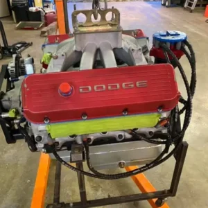 R5P7 368ci Engine, Buy R5P7 368ci Engine, 368 cubic inch race motor, 368ci Mopar motor for sale, Ritter racing block engine, Ritter small block Mopar, Ritter race motor, Dodge dirt modified motor, dirt modified V8 for sale, modified racing engine for sale, circle track Mopar motor, oval track Dodge engine, 755 horsepower race motor, 755hp V8 for sale, 560 lb ft race engine, naturally aspirated Mopar motor, professional Dodge race motor, competition small block Mopar, race prepared Dodge V8, high output small block Dodge, Mopar circle track powerplant, Dodge oval racing motor, used dirt racing motor, dirt track V8 package, modified division engine, open wheel modified motor, circle track engine package, racing small block for sale, steel block competition motor, Ritter block racing package, Harshman Racing engine, Brett Miller race engine, professionally assembled race motor, dyno proven Dodge motor, dyno tuned Mopar V8, conservative race tune, race engine tuning potential, Mopar dyno tuning, Dodge race dyno service, naturally aspirated 755hp engine, high compression Mopar racer, high RPM Dodge small block, competition V8 powerplant, motorsport Dodge small block, purpose built Mopar V8, specialist racing motor, professional motorsport engine, track competition powerplant, dirt oval engine package, circle racing powerplant, short track Dodge motor, race car Mopar conversion, custom competition V8 swap, Mopar race swap project, Dodge motorsport conversion, racing drivetrain project, dirt modified drivetrain, oval track drivetrain, racing transmission pairing, competition bellhousing setup, racing clutch compatibility, motorsport driveline setup, race differential pairing, racing rear axle setup, circle track gearing setup, dirt racing gear ratio, wet sump racing engine, external oil pump motor, single stage external oil pump, racing wet sump system, external oiling Dodge V8, wet sump Mopar racer, race oil pump setup, competition lubrication system, race oil pressure setup, racing oil pan configuration, engine oil plumbing race car, racing oil system inspection, track engine lubrication, race motor oil maintenance, race engine service schedule, used race engine maintenance, competition motor inspection, race engine leak down test, racing motor compression test, used V8 inspection checklist, motorsport engine condition check, race engine rebuild evaluation, competition motor refresh, race engine bearing inspection, racing valvetrain inspection, track motor maintenance guide, used racing V8 buyer guide, how to inspect race motor, how to buy used race engine, dirt motor buying guide, circle track engine buying guide, Mopar racing motor guide, Ritter block specifications, R5 block history, Mopar race block information, Dodge competition block guide, NASCAR derived Mopar architecture, Mopar motorsport block, Dodge racing block technology, professional small block racing, naturally aspirated race technology, racing engine horsepower explained, race engine torque explained, dyno horsepower comparison, engine dyno tuning guide, race motor calibration, competition ignition tuning, race fuel calibration, high performance carb tuning, racing induction setup, competition exhaust tuning, race header selection, dirt track engine cooling, circle track cooling system, racing radiator setup, high RPM cooling requirements, race engine temperature control, dirt modified performance parts, modified racing components, oval track performance parts, circle track racing components, Dodge racing components online, Mopar motorsport parts online, competition engine accessories, race motor accessories, racing engine parts supplier, Dodge performance race shop, Mopar competition parts store, specialty racing engine dealer, used motorsport powerplant dealer, professional race parts supplier, track performance equipment store, engine freight for race cars, racing motor pallet shipping, competition engine transport, nationwide race engine freight, international racing engine freight, performance motor delivery, heavy engine freight quote, race motor collection service, engine crate transportation, motorsport freight logistics, race engine order enquiry, Dodge race motor enquiry, Mopar motor sales enquiry, performance V8 order enquiry, TorqueLine race engine shop, TorqueLine Mopar motors, TorqueLine racing V8s, TorqueLine dirt track parts, TorqueLine competition engines, TorqueLine engine sales, TorqueLine performance catalogue, TorqueLine motorsport components, specialist Dodge engine sales, competition V8 purchase, racing engine online order, used performance motor purchase, professional race engine marketplace, motorsport powertrain store, Dodge race powertrain supplier, Mopar track engine supplier, high horsepower race motor dealer, circle track engine supplier, dirt racing powerplant supplier