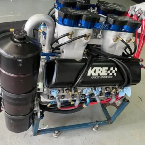 410 Sprint Car Race Engine, Buy 410 Sprint Car Race Engine, Inglis racing motor, Inglis engine freshen, two night race motor, recently freshened dirt engine, low time oval racing motor, All Pro 280-2 engine, All Pro sprint heads, 280-2 cylinder heads, All Pro racing top end, aluminum dirt racing heads, Engler 2.9 system, Engler mechanical injection, 2.9 throttle injection, Engler racing injector, mechanical stack injection, sprint injection stacks, dirt racing induction, mechanical fuel metering, methanol injector system, race fuel barrel valve, high speed bypass system, low speed bypass system, sprint bypass valve, mechanical injection bypass, fuel return racing system, race fuel pump package, cam driven fuel pump, competition methanol pump, sprint fuel delivery, oval track fuel pump, mag box racing ignition, sprint magneto controller, competition magneto system, dirt racing ignition box, oval track ignition system, race magneto accessories, BMRS racing lines, BMRS plumbing kit, lightweight racing hoses, competition braided plumbing, motorsport fluid lines, sprint oil lines, dirt track hose fittings, lightweight race fittings, K&N sprint air box, K&N racing filter, dirt track air filtration, sprint induction filter, race air box assembly, dirt racing intake protection, freshened competition V8, serviced open wheel motor, low use race powerplant, recently rebuilt dirt motor, professional race engine refresh, competition motor service history, oval engine rebuild records, racing motor maintenance log, fresh engine inspection, race motor service documentation, dirt track engine health, competition V8 inspection, race engine leakdown check, racing compression check, valve spring pressure test, valvetrain inspection service, racing bearing inspection, competition crank inspection, race motor dyno check, motorsport engine evaluation, track motor condition report, dirt racing engine prep, open wheel motor preparation, race night maintenance, sprint fuel nozzle cleaning, racing spark plug inspection, methanol system maintenance, mechanical injection service, magneto maintenance, race engine oil service, competition filter inspection, dirt motor startup procedure, race engine pre oiling, sprint oil pressure check, competition warm up procedure, high RPM race preparation, oval track powerplant, winged dirt motor, non wing racing V8, open wheel competition engine, dirt oval powerplant, short track racing V8, methanol dirt motor, naturally aspirated race powerplant, high RPM oval motor, professional sprint powerplant, race team engine package, championship dirt racing motor, track competition V8, oval motorsport engine, dirt racing powertrain, sprint driveline package, open wheel engine installation, race motor plate setup, dirt car engine mounts, competition torque tube setup, sprint rear end compatibility, racing gear ratio selection, oval drivetrain setup, track car fuel plumbing, race car methanol plumbing, sprint header configuration, competition exhaust setup, dirt track cooling package, race radiator system, engine accessory package, complete sprint induction, racing fuel system bundle, race ignition package, competition air filtration, sprint engine accessories, dirt motor components, open wheel performance parts, oval racing components, sprint team parts supplier, dirt racing parts dealer, professional motorsport store, competition V8 retailer, oval engine marketplace, race motor online store, used racing powerplant supplier, freshened race engine dealer, motorsport engine sales, professional dirt motor supplier, specialist open wheel parts, sprint performance shop, race powerplant purchase, dirt motor order enquiry, oval engine buying guide, fresh race motor checklist, competition engine buyer guide, mechanical injection buying guide, sprint cylinder head guide, dirt racing fuel system guide, magneto ignition guide, race engine freshening guide, oval motor maintenance guide, sprint motor inspection guide, race powerplant service intervals, competition engine preparation guide, dirt motor longevity, racing engine freight service, sprint motor pallet shipping, competition V8 transport, oval engine freight, dirt motor delivery, motorsport powerplant logistics, race engine collection service, palletized motor transportation, nationwide race motor freight, international motorsport shipping, TorqueLine sprint racing, TorqueLine dirt motors, TorqueLine oval parts, TorqueLine race engines, TorqueLine competition powerplants, TorqueLine motorsport catalogue, TorqueLine racing components, TorqueLine engine enquiries, TorqueLine performance store, TorqueLine used motors