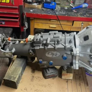 C&R Dog Box 4 Speed Transmission, Buy C&R Dog Box 4 Speed Transmission, C&R racing gearbox, C&R manual gearbox, C&R competition transmission, C&R motorsport gearbox, four ratio race gearbox, manual racing gearset, H gate competition gearbox, H gate racing transmission, H shift race gearbox, traditional race shifter, four gear competition transmission, motorsport four gear gearbox, direct engagement race transmission, face dog racing gearbox, dog clutch manual transmission, non synchro racing gearbox, unsynchronized competition transmission, quick engagement manual gearbox, positive engagement race gearbox, racing dog clutch system, Toyota RZ race gearbox, RZ powered race transmission, Toyota four cylinder gearbox swap, Toyota truck race drivetrain, Tacoma racing transmission conversion, Hilux performance gearbox conversion, Toyota drag drivetrain conversion, Toyota circuit gearbox conversion, Toyota motorsport drivetrain, Toyota competition gearbox swap, 2RZ race transmission conversion, 2RZ performance gearbox swap, 2RZ manual racing gearbox, 2RZ competition drivetrain, 2RZ track car transmission, 2RZ drag car gearbox, 2RZ gearbox conversion plate, 2RZ motorsport transmission, 2RZ racing driveline, 2RZ custom gearbox setup, 3RZ race transmission conversion, 3RZ performance gearbox swap, 3RZ manual racing gearbox, 3RZ competition drivetrain, 3RZ track car transmission, 3RZ drag car gearbox, 3RZ gearbox conversion plate, 3RZ motorsport transmission, 3RZ racing driveline, 3RZ custom gearbox setup, Toyota gearbox adapter engineering, race transmission adapter plate, custom manual gearbox adapter, competition bellhousing adapter, racing drivetrain adapter, engine gearbox conversion plate, custom gearbox fitment plate, performance transmission conversion, race engine gearbox mating, motorsport drivetrain fabrication, competition clutch selection, racing clutch disc fitment, race flywheel selection, manual gearbox pilot bearing, performance pressure plate setup, racing release bearing, clutch spline identification, input shaft clutch matching, competition clutch geometry, race clutch installation, racing driveshaft fabrication, competition prop shaft setup, gearbox output spline identification, custom race driveshaft, motorsport driveline alignment, racing universal joint setup, track car driveshaft length, competition transmission mount, custom gearbox crossmember, race drivetrain geometry, gearbox ratio selection guide, race car gearing calculator, final drive ratio planning, tire diameter gearing calculation, competition gear spacing, race engine powerband gearing, track car final drive setup, drag racing gear selection, circuit racing ratio setup, hill climb gearbox ratios, motorsport gearing strategy, dog ring inspection guide, racing gear tooth inspection, competition gearbox bearing service, selector fork inspection, race transmission maintenance, manual race gearbox servicing, competition gearbox oil change, motorsport transmission lubricant, racing gearbox rebuild guide, used competition gearbox inspection, dog engagement wear symptoms, race gearbox shift technique, clutchless race shifting guide, throttle lift gear change, rev matching race gearbox, dog engagement driving technique, competition downshift technique, track gearbox operation, race transmission driver training, manual race car shifting, high rpm gearbox shifting, circuit racing manual transmission, time attack manual gearbox, hill climb racing transmission, autocross race gearbox, drag racing manual gearbox, track day competition transmission, tube chassis manual gearbox, lightweight race drivetrain, purpose built track gearbox, professional motorsport transmission, performance car race gearbox, race transmission for Toyota, custom Toyota track drivetrain, Toyota race car manual gearbox, boosted Toyota racing transmission, turbo Toyota gearbox solution, high output Toyota drivetrain, Toyota competition clutch setup, race transmission parts supplier, used racing gearbox dealer, motorsport transmission marketplace, performance gearbox retailer, competition transmission seller, specialist manual gearbox supplier, race drivetrain parts store, used track gearbox supplier, professional motorsport parts shop, racing transmission sales company, four speed race gearbox sale, H pattern race gearbox sale, dog engagement gearbox sale, Toyota race gearbox sale, competition manual transmission sale, motorsport gearbox package, used performance transmission sale, track transmission supplier, racing gearbox purchase guide, specialist gearbox sales, transmission pallet freight, race gearbox shipping service, motorsport transmission delivery, competition gearbox transportation, nationwide transmission freight, international race gearbox shipping, performance drivetrain logistics, gearbox crate transport, heavy transmission shipping, race parts freight service, TorqueLine race gearboxes, TorqueLine Toyota drivetrains, TorqueLine manual transmissions, TorqueLine competition gearboxes, TorqueLine track parts, TorqueLine used transmissions, TorqueLine motorsport drivetrains, TorqueLine gearbox shipping, TorqueLine performance transmissions, TorqueLine racing parts