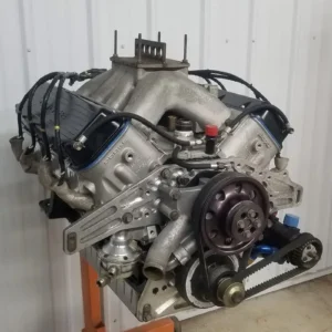 358CI R5P7 NASCAR Engine, Buy 358CI R5P7 NASCAR Engine, EEI-015 motor, EEI NASCAR powerplant, Ernie Elliott Dodge motor, Ernie Elliott competition V8, Elliott racing powerplant, Elliott-built Mopar motor, EEI racing engine records, EEI dyno documented motor, MTI Racing Dodge motor, MTI engine records, documented Elliott motor, serial numbered race motor, Dodge Cup racing powerplant, ex stock car Dodge motor, Mopar stock car powerplant, professional Dodge race V8, vintage stock car motor, competition Dodge small block, high RPM Mopar powerplant, naturally aspirated Dodge racer, 4.185 bore race motor, 3.252 stroke crankshaft, Bryant eight bolt crank, Bryant racing crank, short stroke Dodge motor, JE forged piston motor, twelve to one compression V8, high compression Mopar racer, EEI cylinder heads, Elliott ported racing heads, 2016 racing cylinder heads, EEI-65E manifold, Mopar competition intake, ported Dodge racing heads, high flow Mopar top end, T&D eccentric rockers, four bolt shaft rockers, high ratio shaft rocker, 2.05 rocker ratio, 1.95 rocker ratio, race shaft valvetrain, keyed roller lifters, bushed roller lifter motor, roller cam Dodge motor, competition roller valvetrain, Jesel cam belt system, Jesel racing belt drive, carbon timing cover, carbon fiber race engine parts, six stage dry sump, Johnson racing oil pump, Johnson six stage pump, stainless racing oil pan, external lubrication V8, BMRS braided plumbing, lightweight racing fittings, competition oil hose package, CV Products billet pump, billet racing fuel pump, ATI racing damper, performance harmonic damper, Crane dual pickup distributor, Crane racing ignition, dual pickup race distributor, Proform 950 carburetor, 950 CFM racing carb, new Proform carb, carbureted Mopar race motor, mechanical race fuel system, race carburetor tuning, NASCAR carburetor setup, dyno sheet race engine, documented dyno powerplant, engine performance records, racing dyno documentation, engine build history, competition motor provenance, used race engine documentation, borescope inspected motor, cylinder wall inspection, low run time race motor, freshly serviced NASCAR motor, internal engine inspection, racing cylinder bore condition, race motor pre purchase inspection, competition engine evaluation, used race motor checklist, high performance motor inspection, racing engine service history, R5 bolt pattern, Dodge racing bellhousing pattern, custom engine midplate, Powerglide adapter plate, Mopar transmission conversion, racing transmission adapter, custom bellhousing conversion, small block Mopar adapter, Powerglide race conversion, drivetrain fabrication parts, racing motor plate machining, custom transmission midplate, race chassis engine conversion, drag car Dodge powerplant, drag and drive Dodge V8, burnout competition motor, race boat Dodge powerplant, vintage NASCAR restoration engine, stock car restoration motor, custom Mopar race project, tube chassis Dodge build, pro touring Mopar powerplant, high end restomod motor, track car Dodge engine, specialist motorsport conversion, racing engine installation, dry sump installation guide, external oil tank setup, race engine oil priming, dry sump pressure check, competition cooling requirements, race fuel requirements, high compression fuel guide, carb jetting race engine, ignition timing competition V8, high RPM valvetrain maintenance, shaft rocker adjustment, roller lifter inspection, belt drive maintenance, dry sump service schedule, racing engine startup procedure, competition motor warm up, race engine storage guide, specialist Dodge engine dealer, used Mopar racing motor supplier, NASCAR parts marketplace, competition V8 retailer, motorsport powertrain supplier, Dodge race parts shop, professional engine sales, rare Mopar motor dealer, racing powerplant marketplace, performance V8 supplier, stock car parts retailer, racing engine order enquiry, documented motor purchase, collectible race engine sale, historic racing engine supplier, specialist motorsport parts store, engine freight quote, race motor pallet transport, motorsport powerplant delivery, nationwide engine freight, international racing motor shipping, palletized V8 transport, competition motor logistics, race engine crate shipping, heavy engine freight service, racing motor collection, TorqueLine Elliott engines, TorqueLine Mopar motors, TorqueLine Dodge racing parts, TorqueLine documented engines, TorqueLine competition motors, TorqueLine used powerplants, TorqueLine race parts catalogue, TorqueLine motorsport sales, TorqueLine engine shipping, TorqueLine performance powertrains